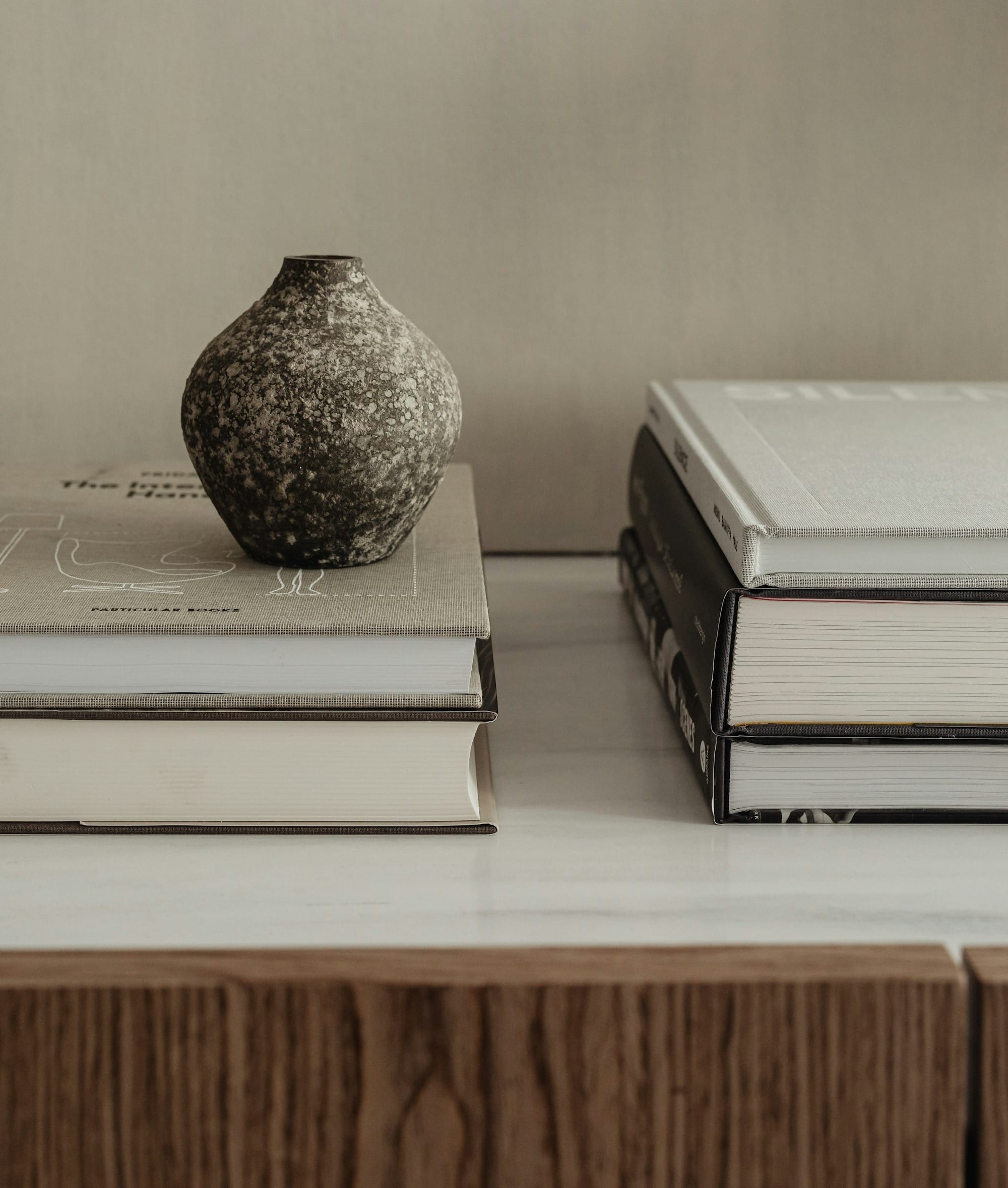 a vase and some books